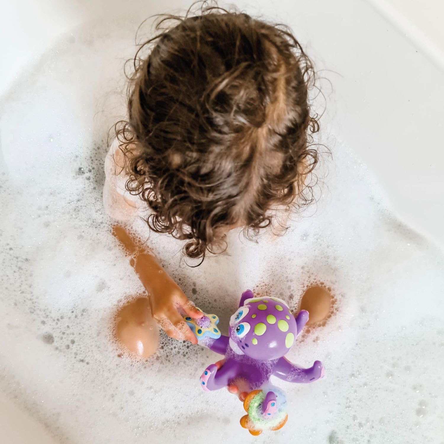 Nuby Floating Octopus Toy with 3 Hoopla Rings - Baby Bath Toy for Boys and Girls - 18+ Months - Purple (Pack of 1) - Medaid International
