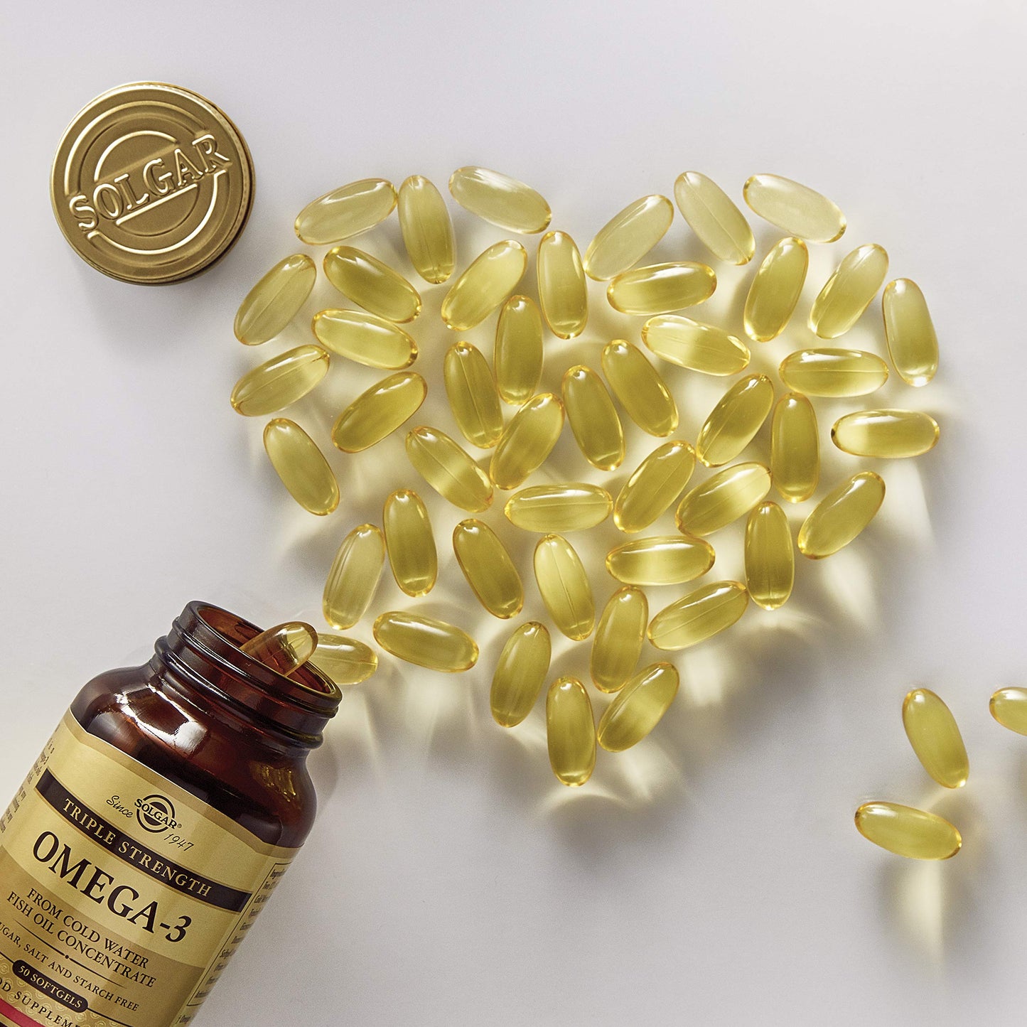 Solgar Triple Strength Omega-3 950 mg, 100 Softgels - Supports Cardiovascular, Joint & Skin Health - Heart Healthy Supplement - Essential Fatty Acids - Non GMO, Gluten Free, Dairy Free - 100 Count - Medaid International